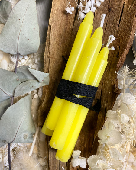 yellow prayer candles