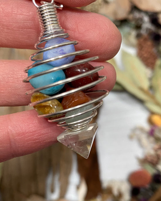 Mixed Gems with Quartz Pendulum