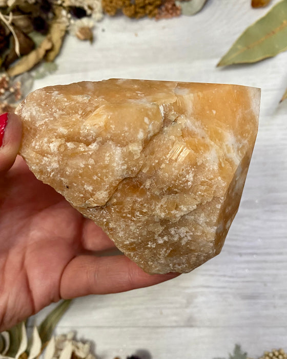 Orange Calcite Half Polished Point