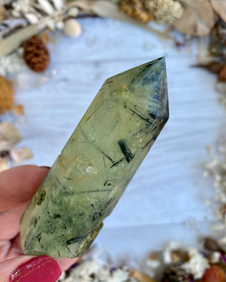 prehnite with tourmaline point